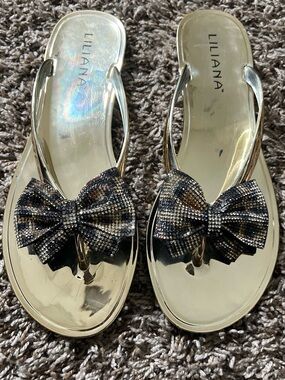 Liliana Gold Thong Sandals with Leopard Rhinestone Bow